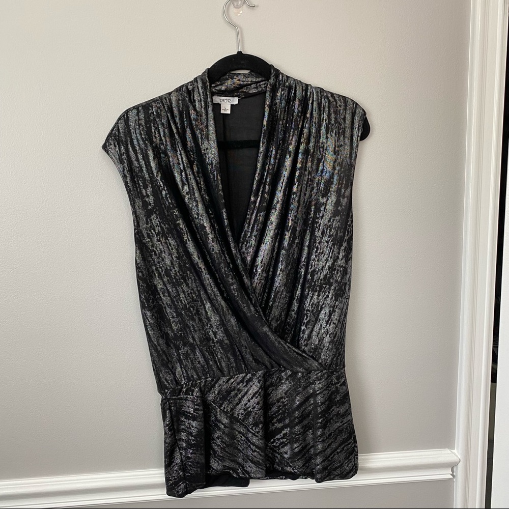 Like new cache silver and black top
